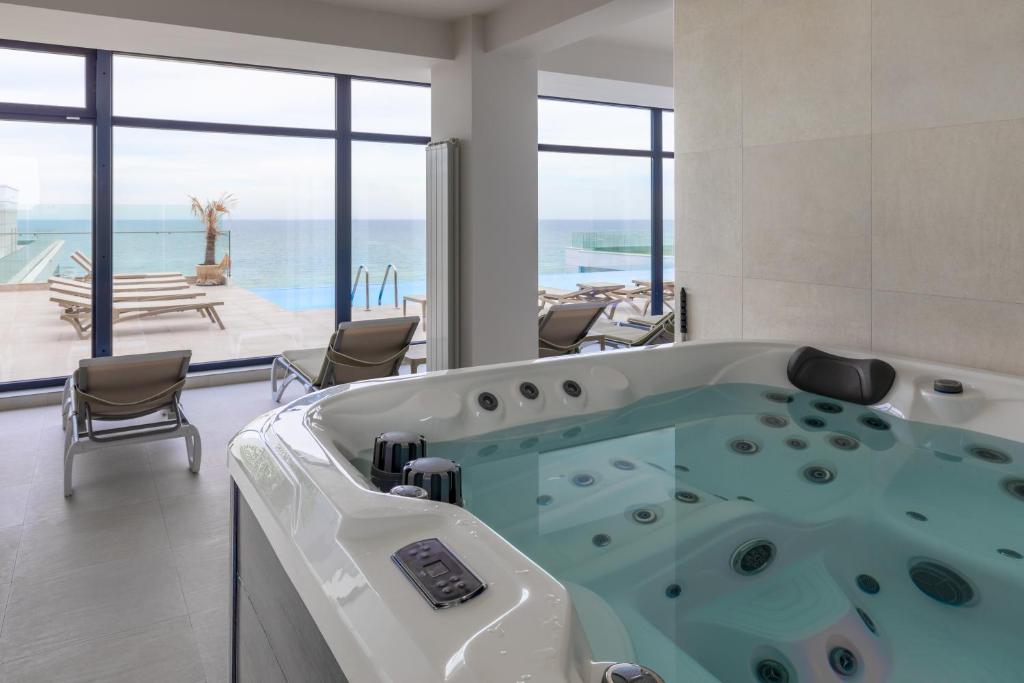 Sandy Breeze - Jacuzzi & Sauna Infinity Resort